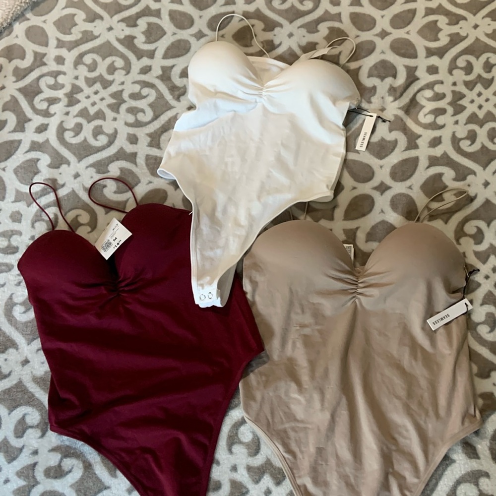 Stretch bodysuit with cup in three beautiful colors size M